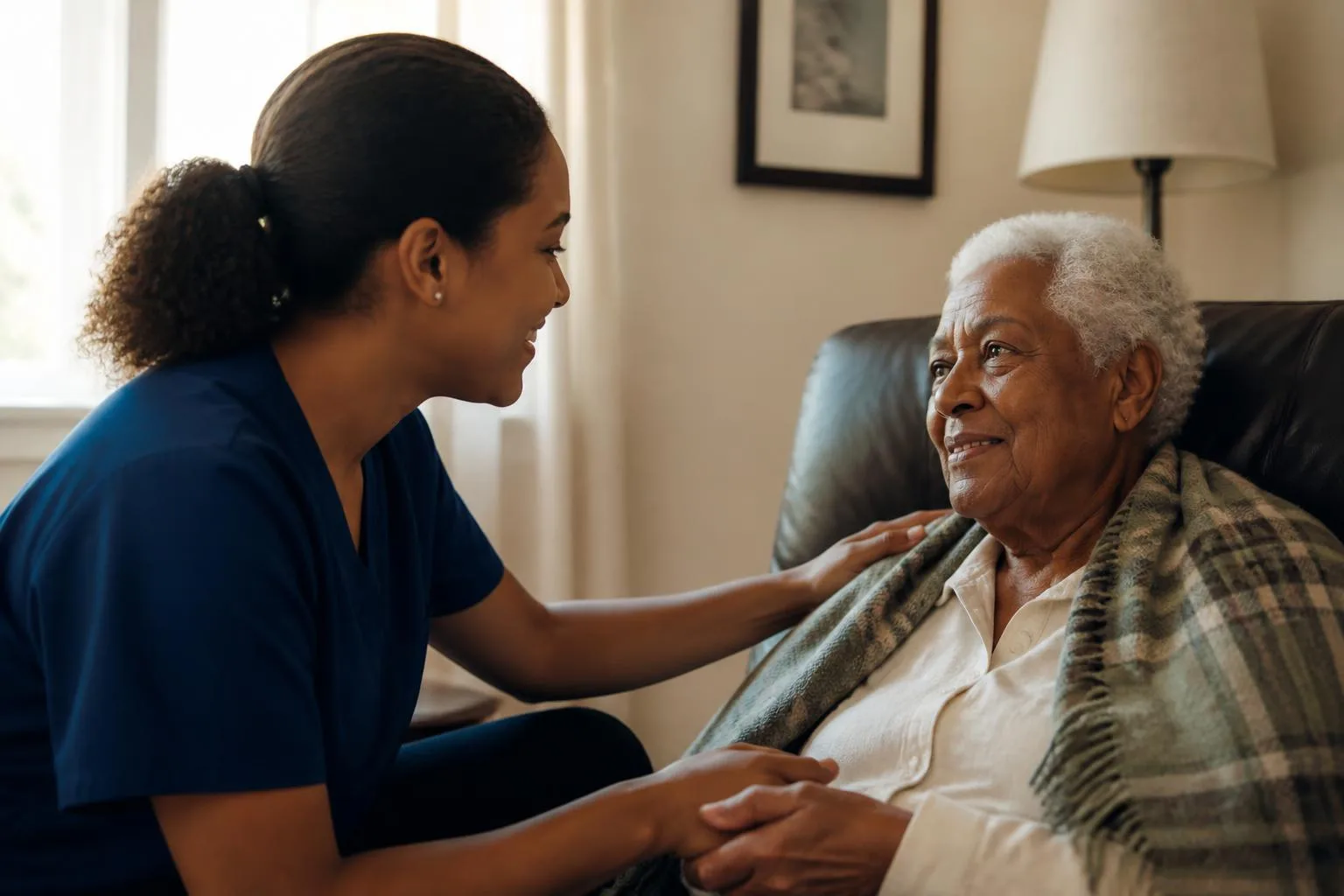 Caregiver checking in on an elderly person at home